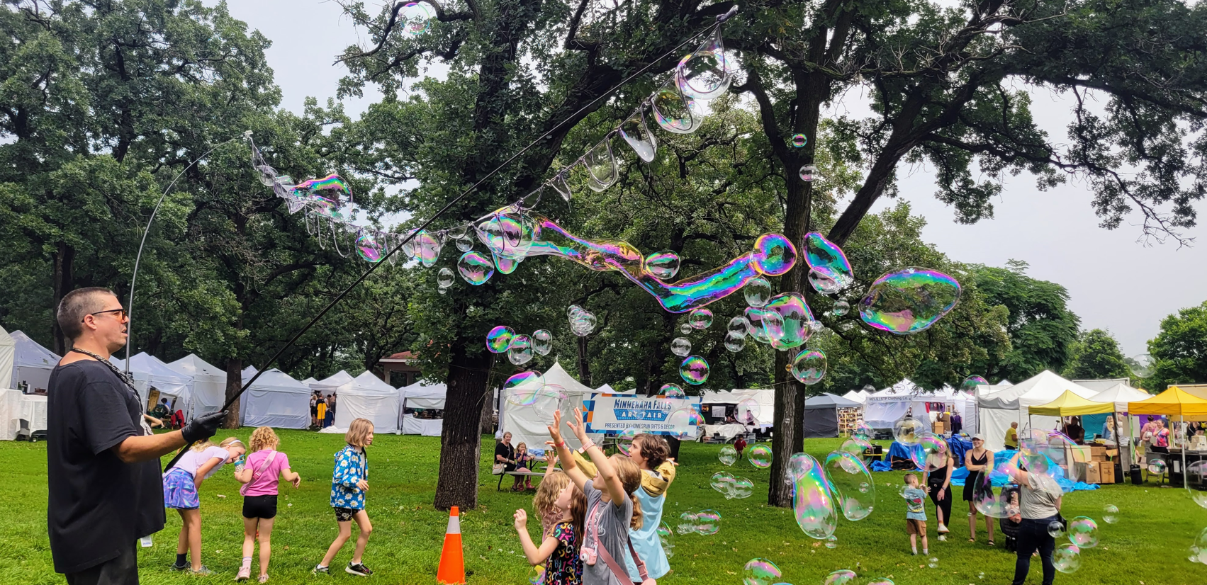 Children playing with bubbles at Minnehaha Art Fair Children playing with bubbles at Minnehaha Art Fair