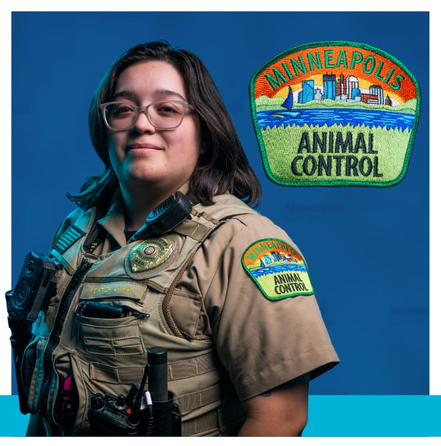 Animal care and control person wearing tan uniform with animal control badge