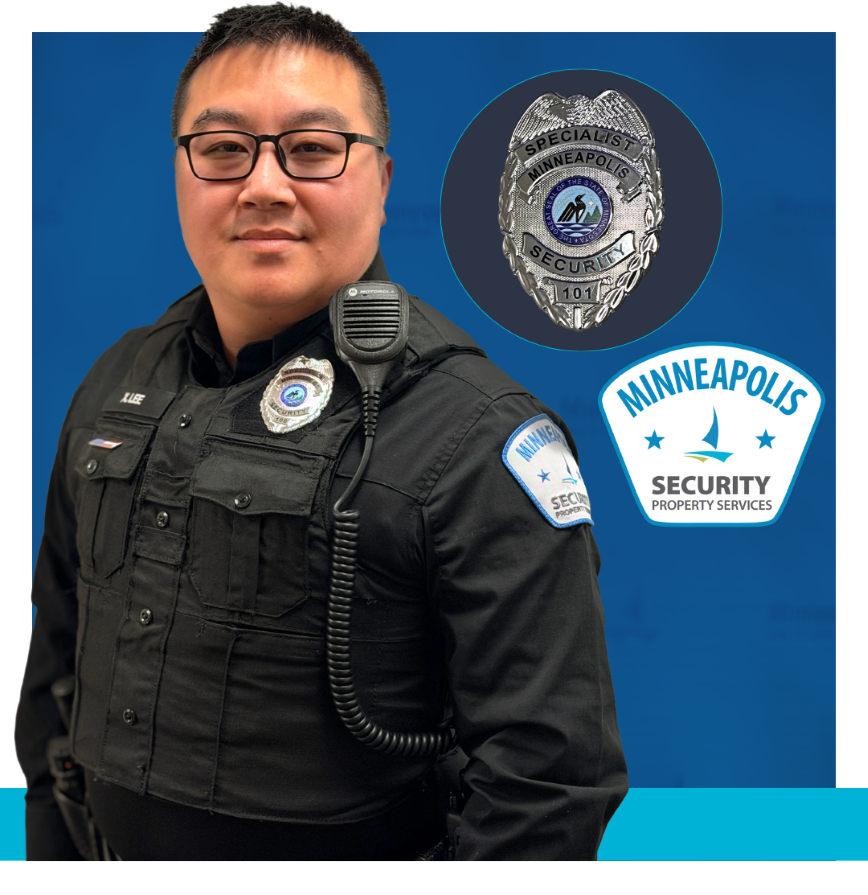 City Security employee wearing a black uniform with badges that say Minneapolis security property services and specialist Minneapolis security 101