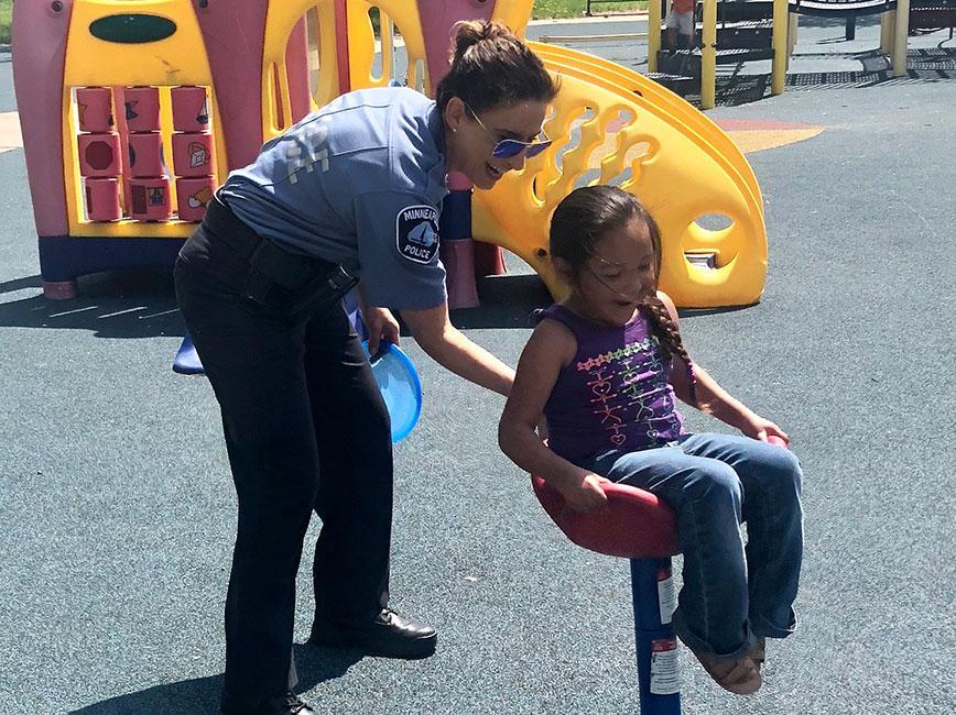 Police officer with kid.