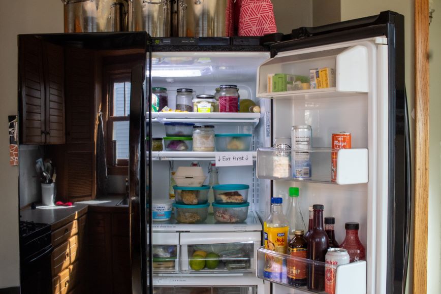 Fridge with food organized inside