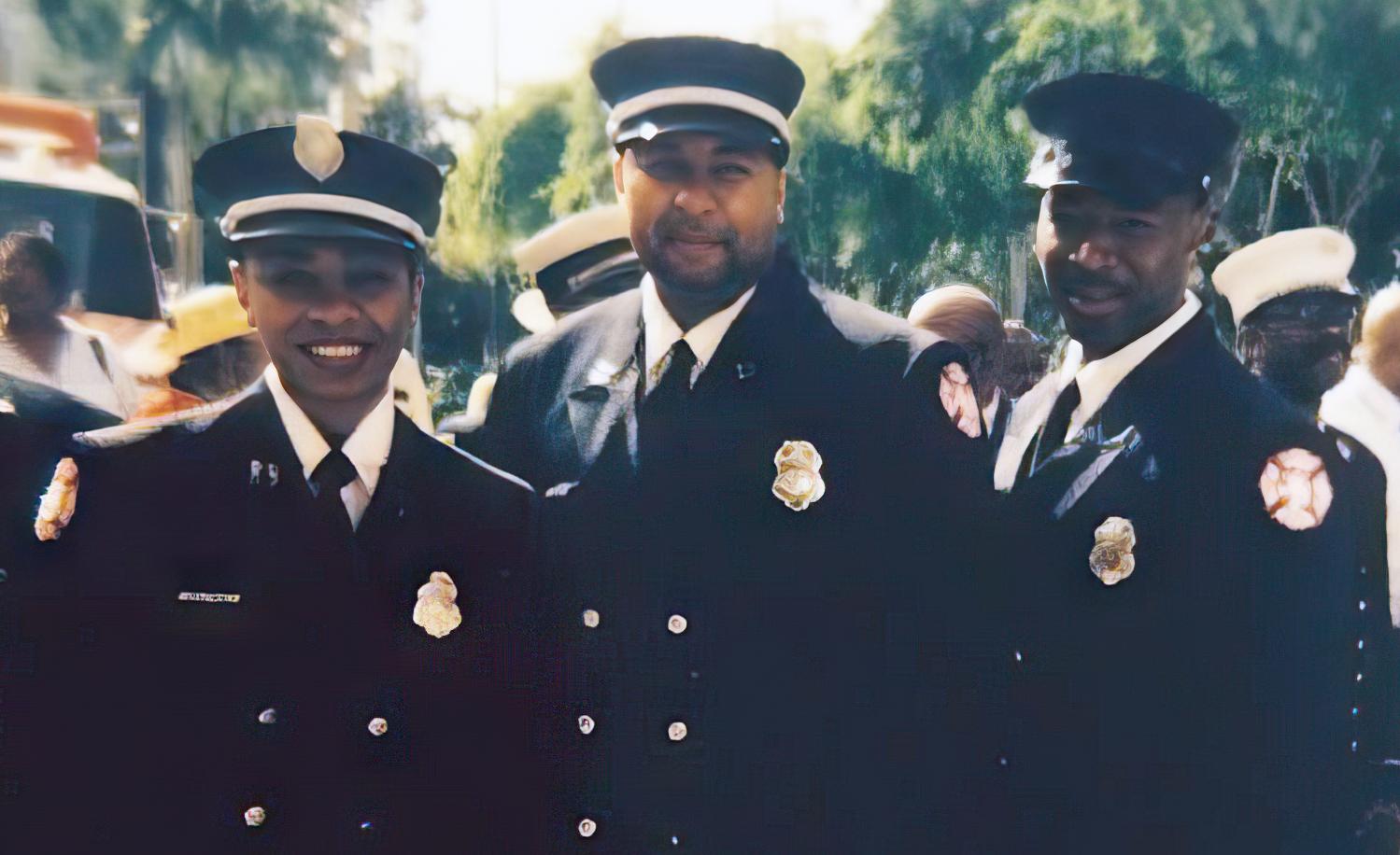 Minneapolis Assistant Fire Chief Melanie Rucker, Chief Bryan Tyner, and FMO Charles Rucker at the International Association of Black Professional Firefighters Conference in 2005. Minneapolis Assistant Fire Chief Melanie Rucker, Chief Bryan Tyner, and FMO Charles Rucker at the International Association of Black Professional Firefighters Conference in 2005.