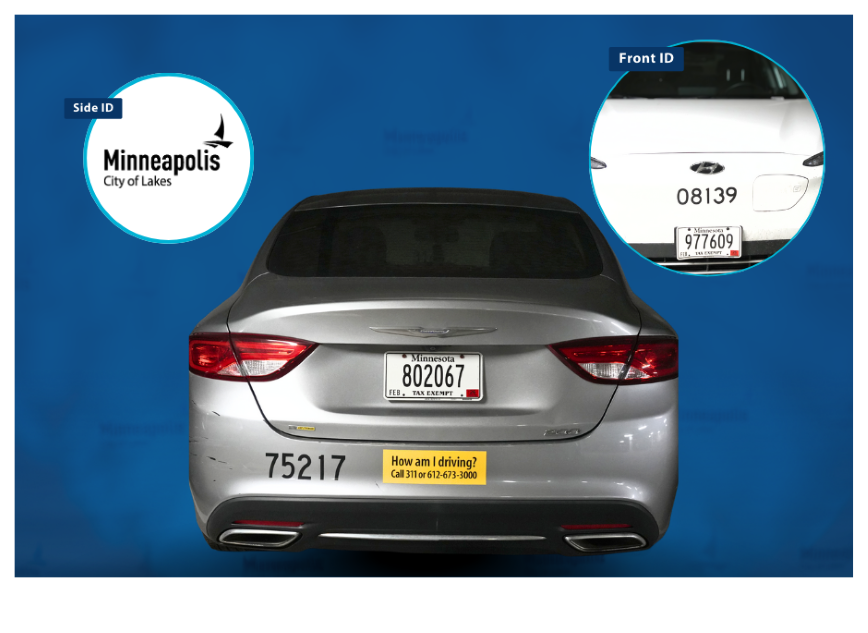 Silver car that says Minneapolis City of Lakes