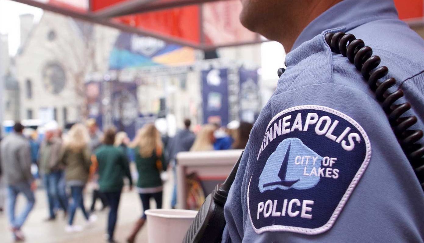 Police officer near crowd of people