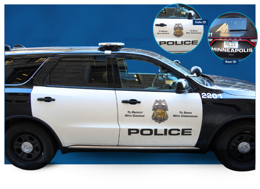 Black and White police car that says To protect with courage to serve with compassion Police