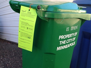 green tag on organics recycling cart