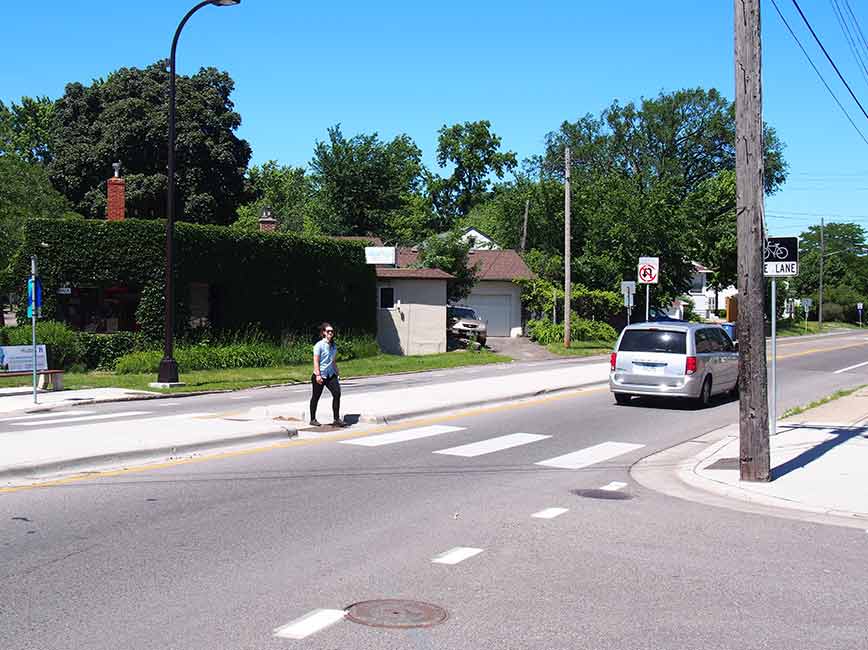 Person walking across the street Person walking across the street