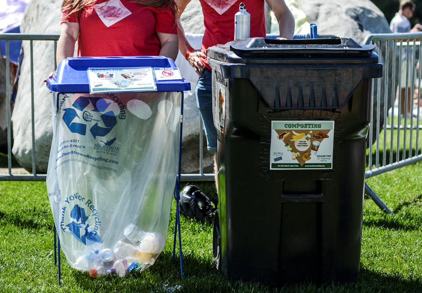 X-frame recycling bin and organics cart at an event