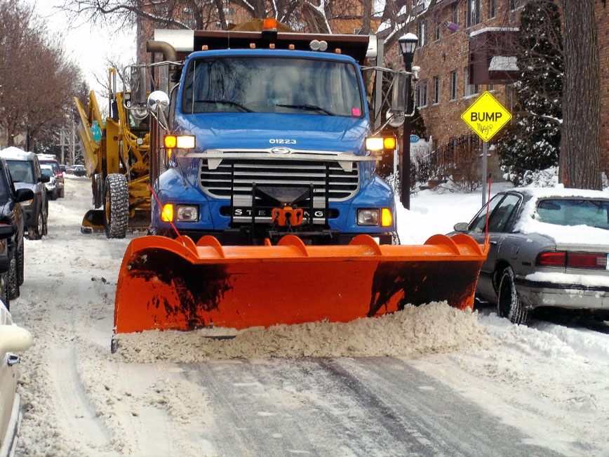 Snow plow on street