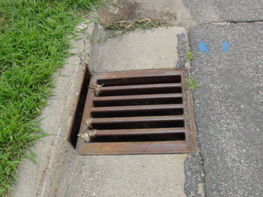 Square sewer grate along Vincent Ave. N. Square sewer grate along Vincent Ave. N.