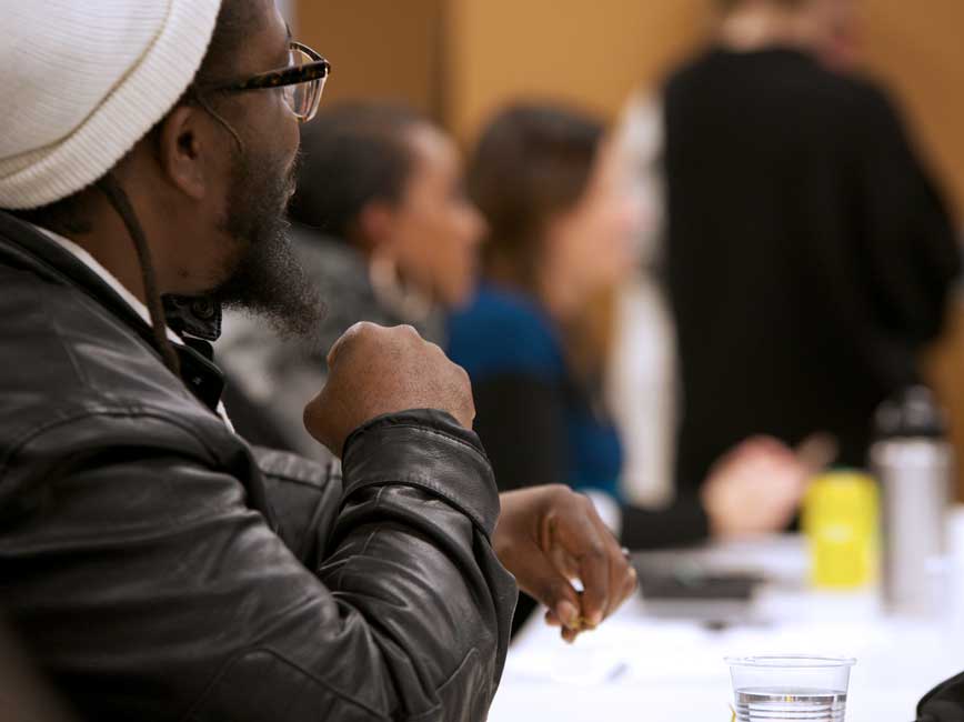 People at community meeting.