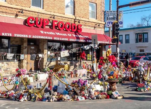 flowers in front of Cup Foods flowers in front of Cup Foods