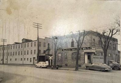 C.A Smith and Northwestern Compo Board Factory Building and C.A. Smith Office Building, looking northwest from Lyndale Ave. N. Date unknown.