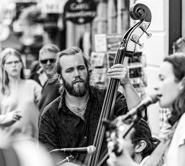 person using disc jockey equipment