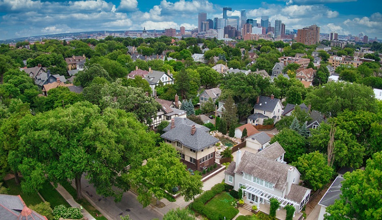 Minneapolis neighborhood with skyline in background