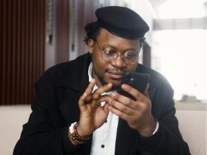 Person using cell phone Person using cell phone