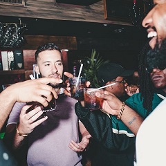 people clinking glasses