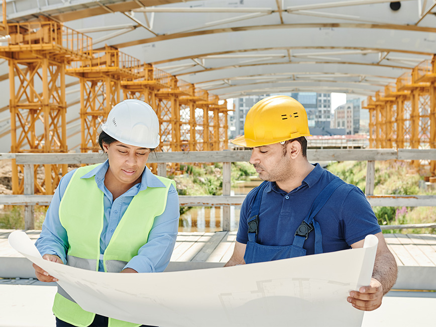 Building inspector looking at building plan