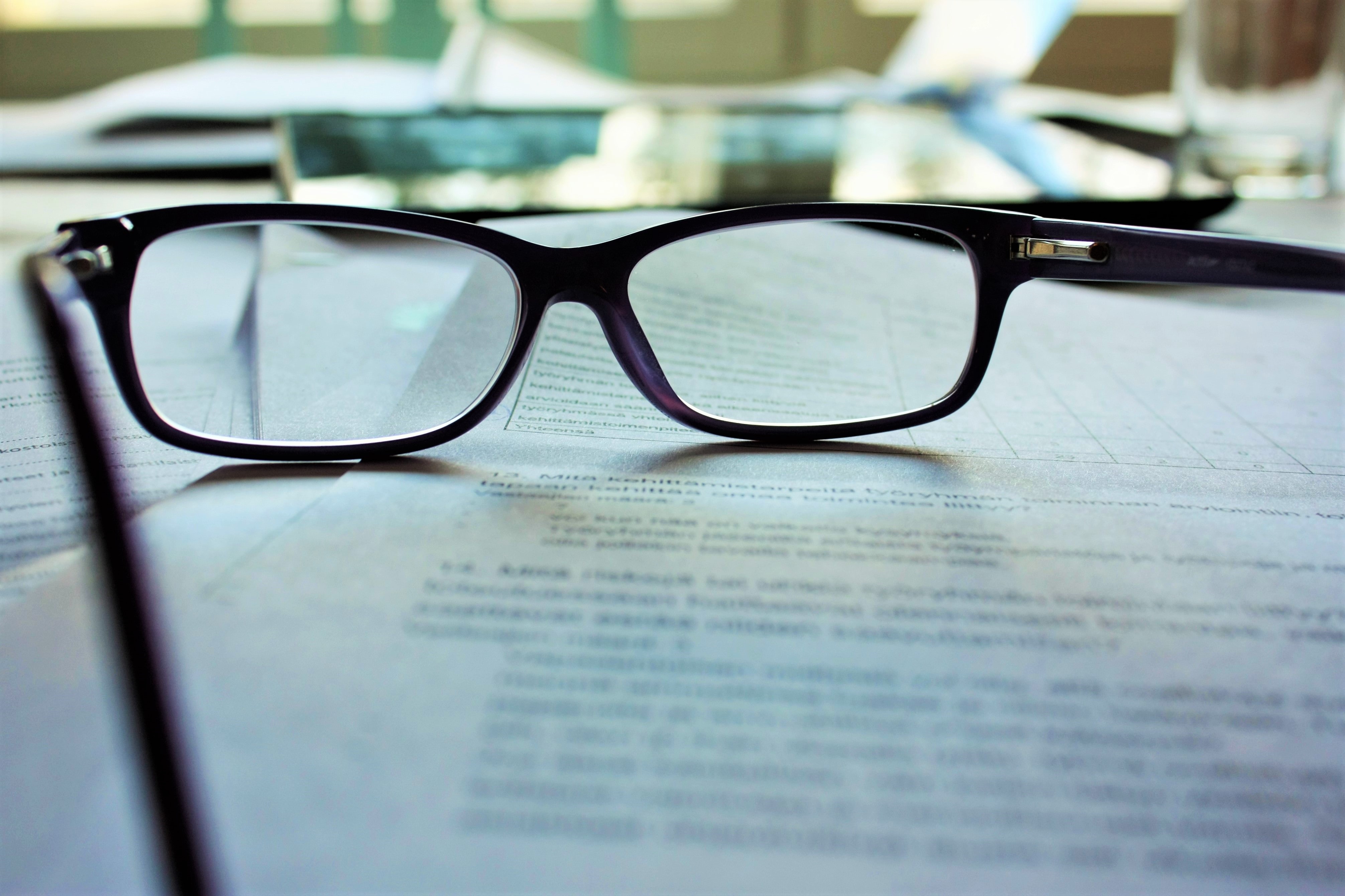 Glasses on paperwork