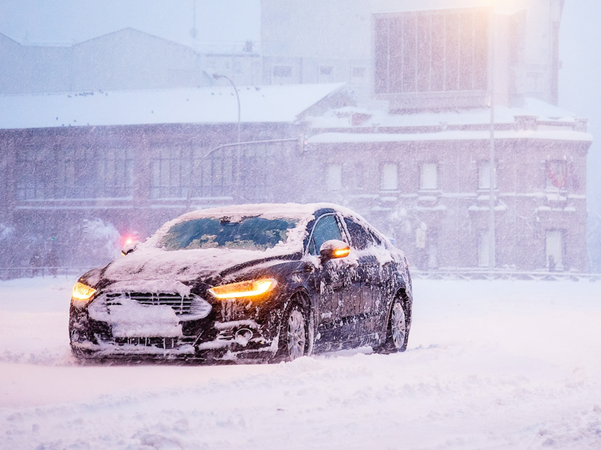 Car driving in snow