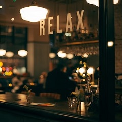 relax sign outside bar