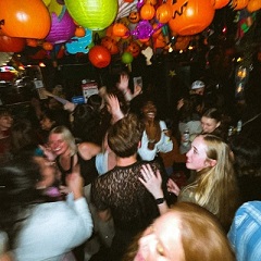 people dancing in bar