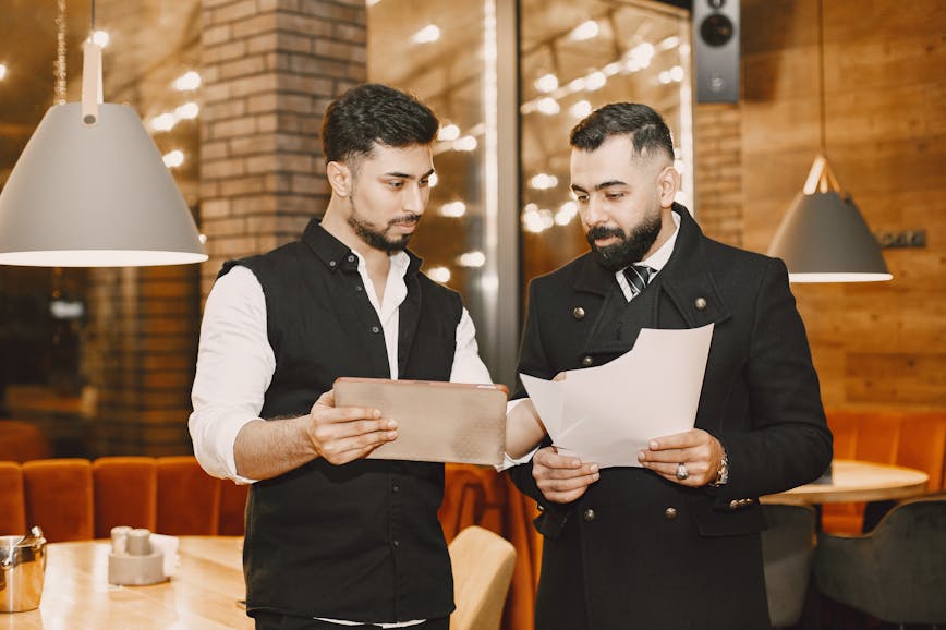 Three cocktail glasses with colorful drinks