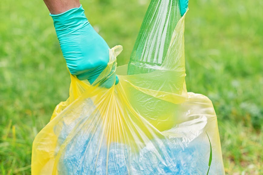 Cleaning up trash outdoors