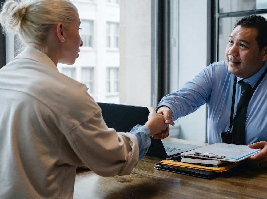 Two people shaking hands