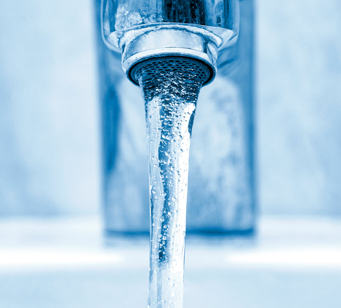 Water flowing from a faucet